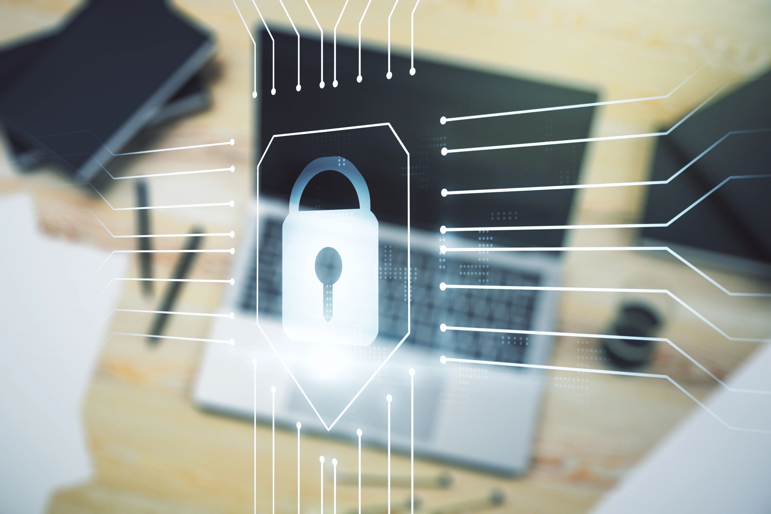 Information security concept with lock overlay on laptop