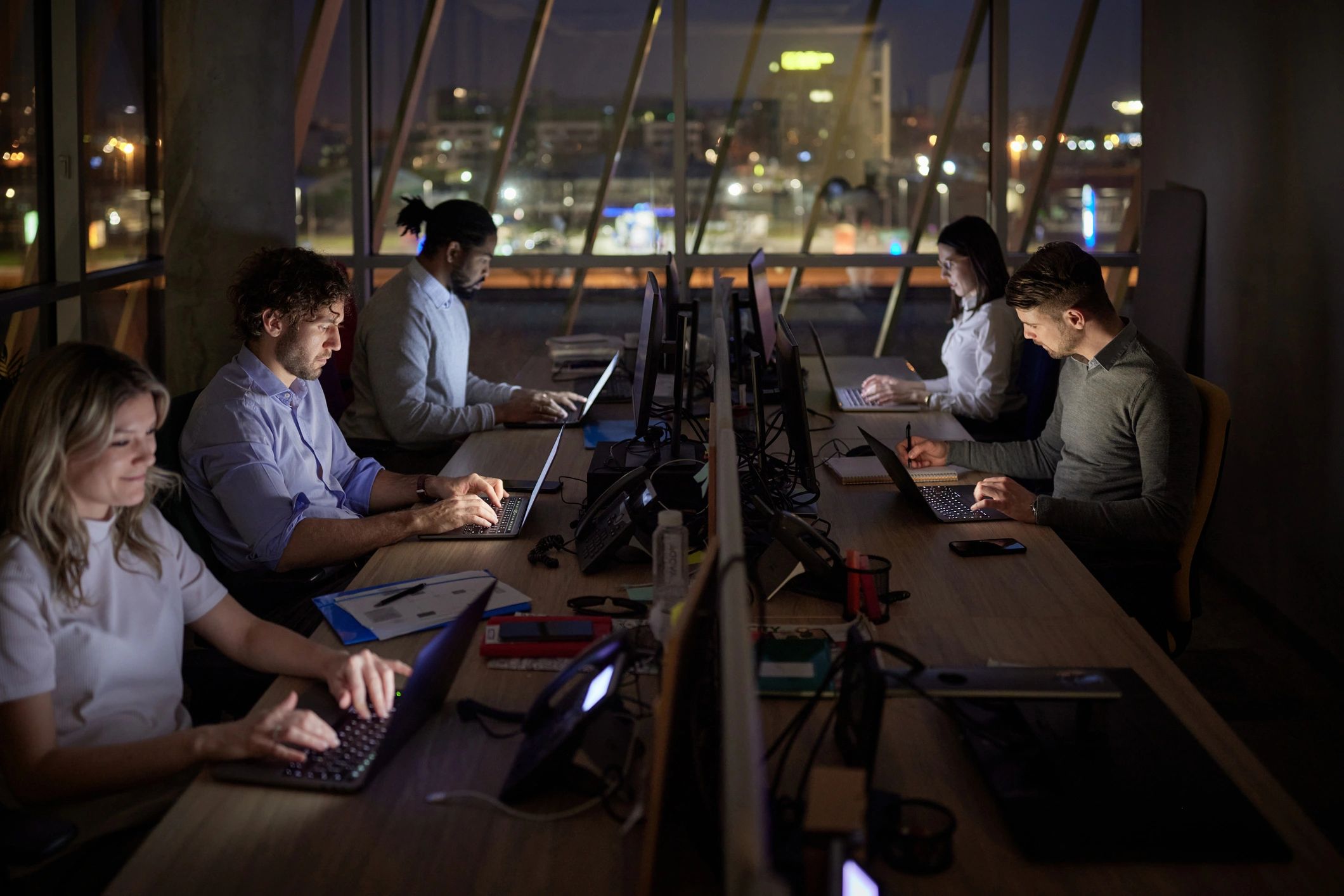 Security team collaborating in an office setting