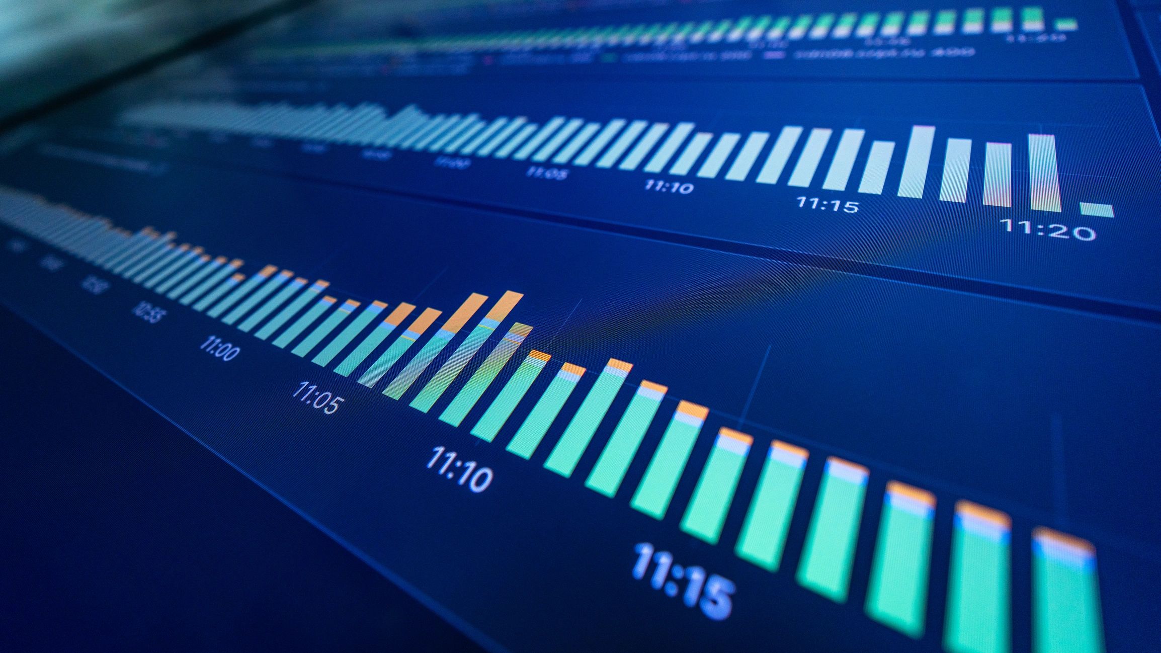 Digital charts and graphs on a display representing security analytics