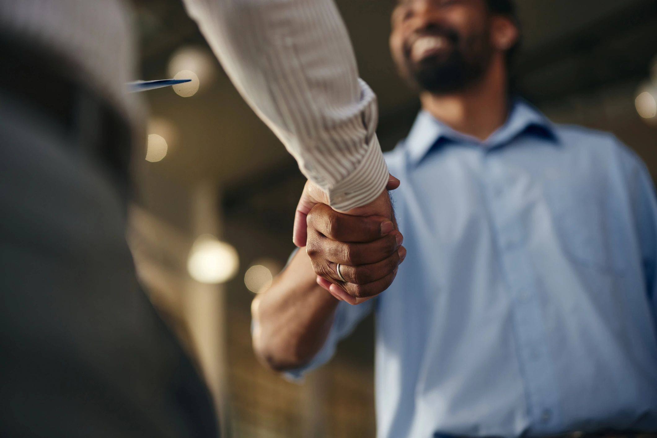 Business handshake representing partnership and trust